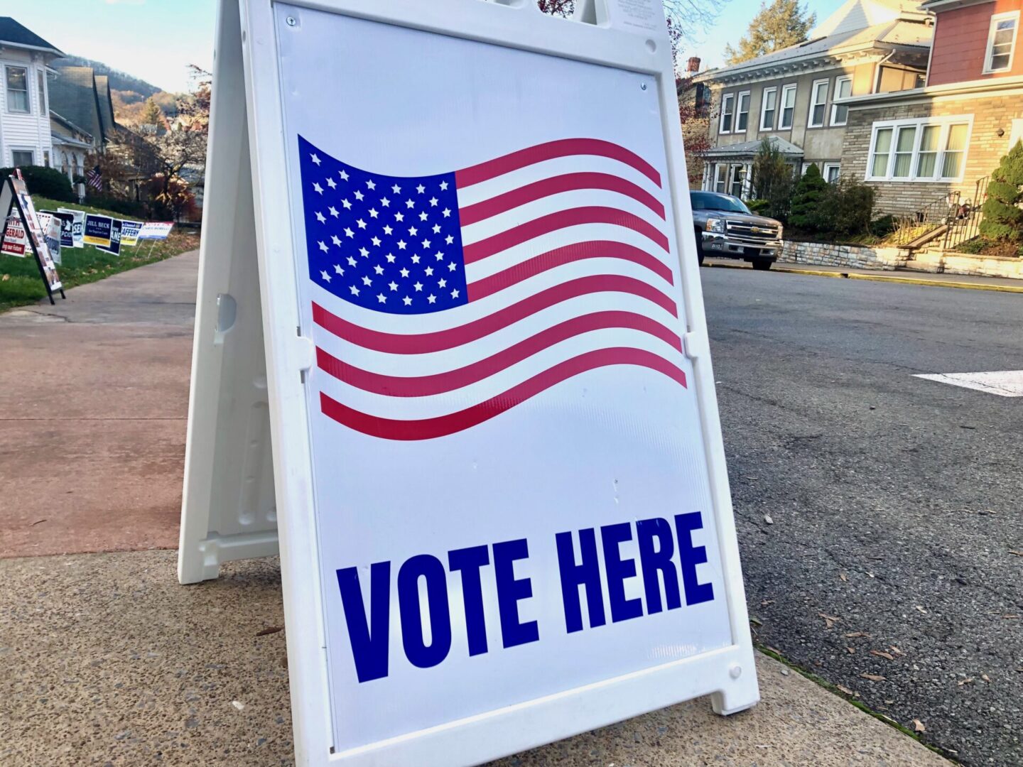 A "Vote Here" sign sits outside Centre County precinct 5 at Bellefonte Presbyterian Church, 203 N. Spring St., on Nov. 7, 2023.