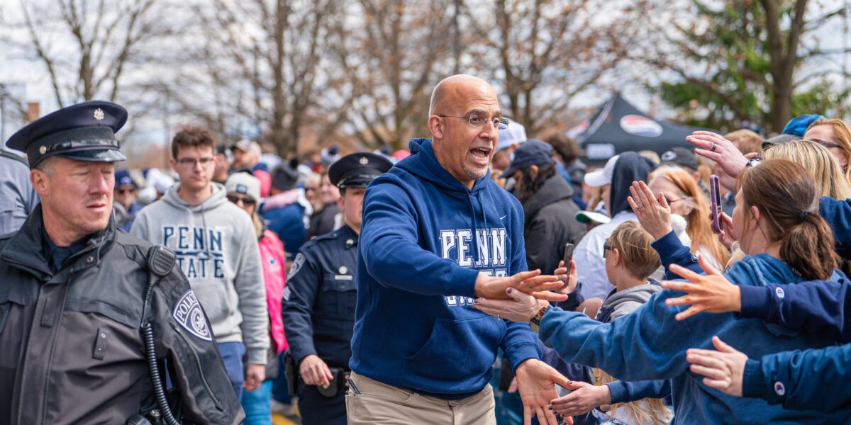 Penn State coach James Franklin greets fans during the team arrival outside Beaver Stadium before the Blue-White Game on April 13, 2024. Photo by Giovanna Lee | Onward State