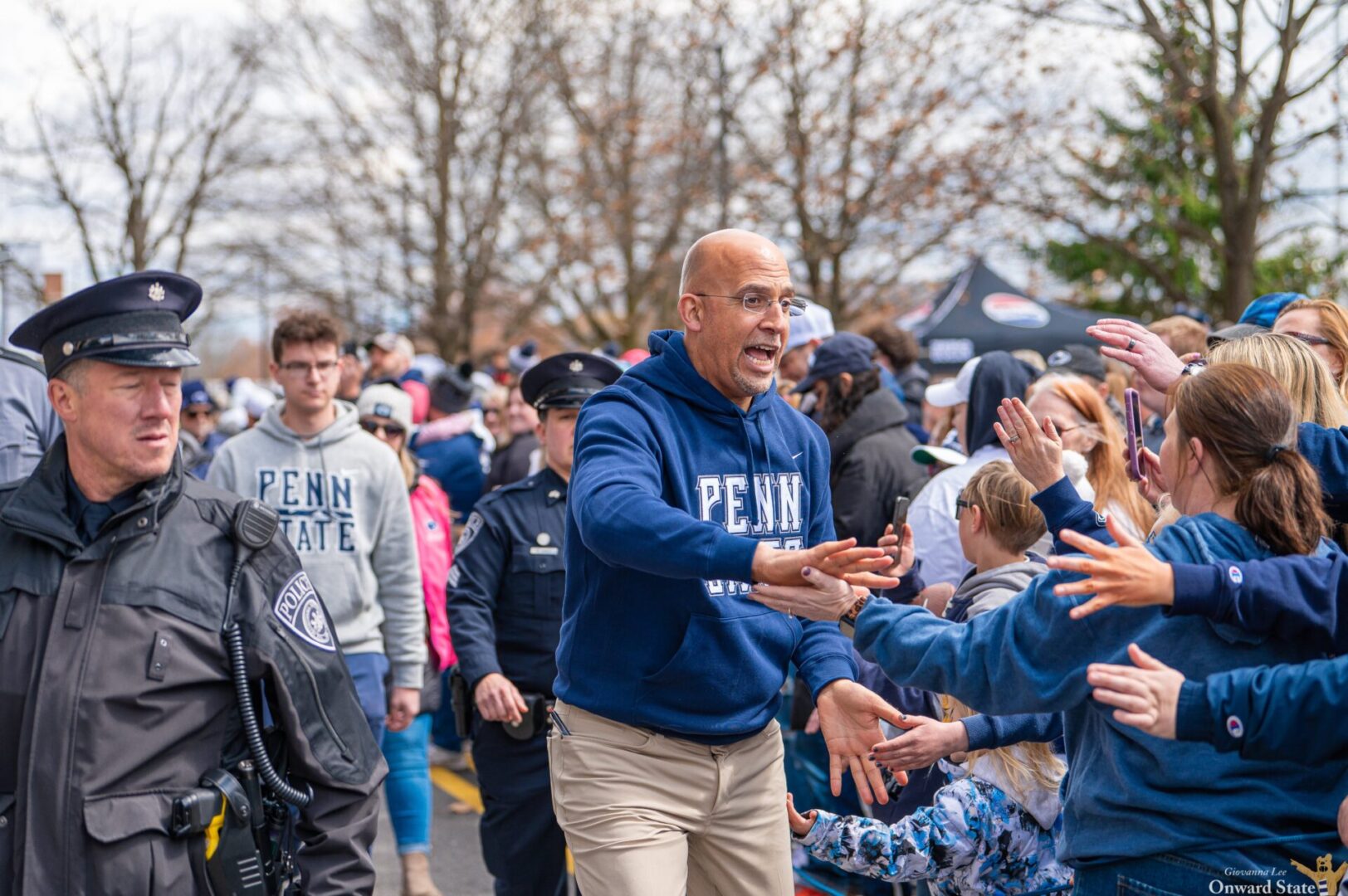 Penn State coach James Franklin greets fans during the team arrival outside Beaver Stadium before the Blue-White Game on April 13, 2024. Photo by Giovanna Lee | Onward State