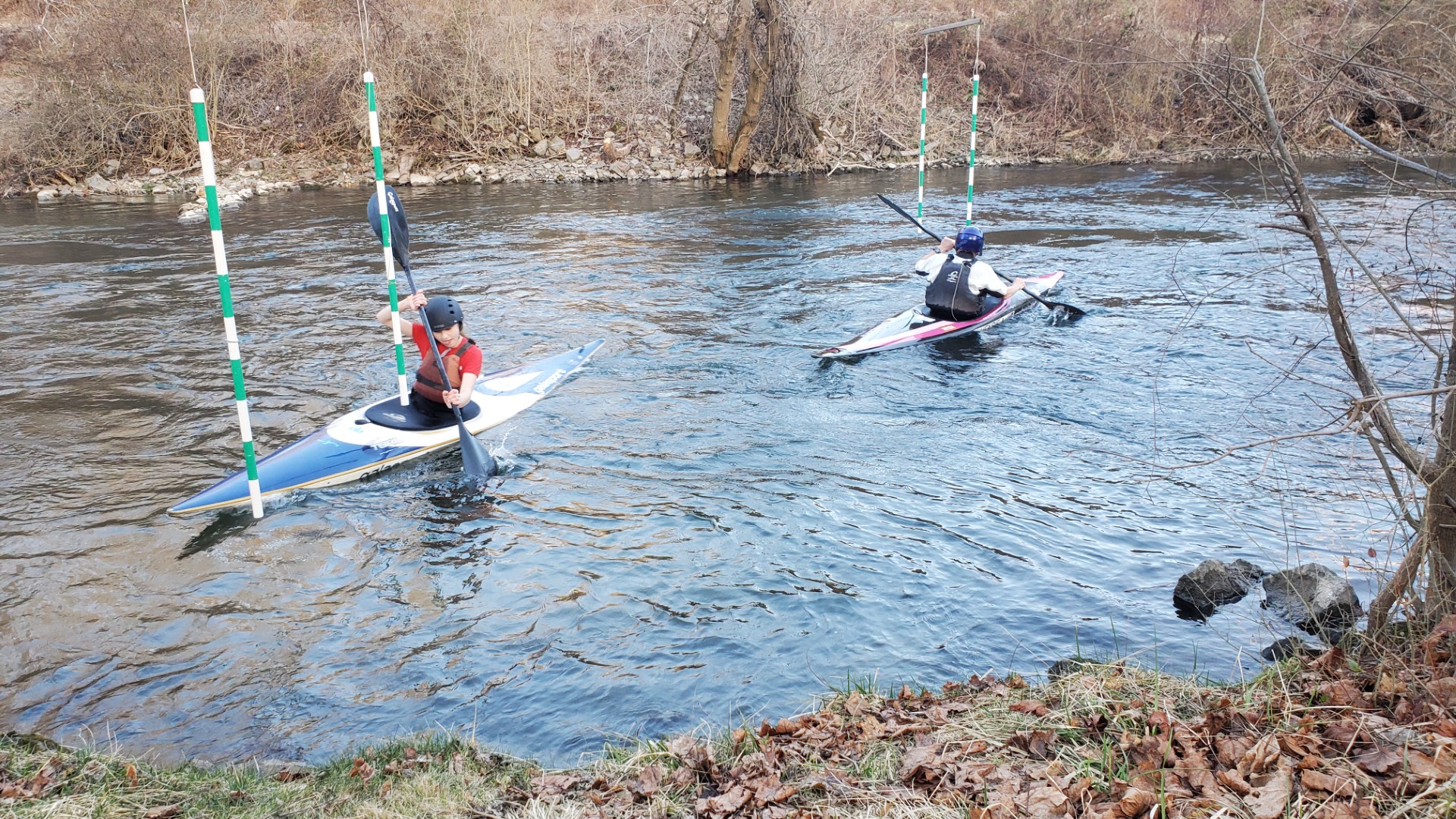 State College - on the Sunnyside Paddling Park with Ava Harchak entering the green gate and Dave Kurtz heading upstream