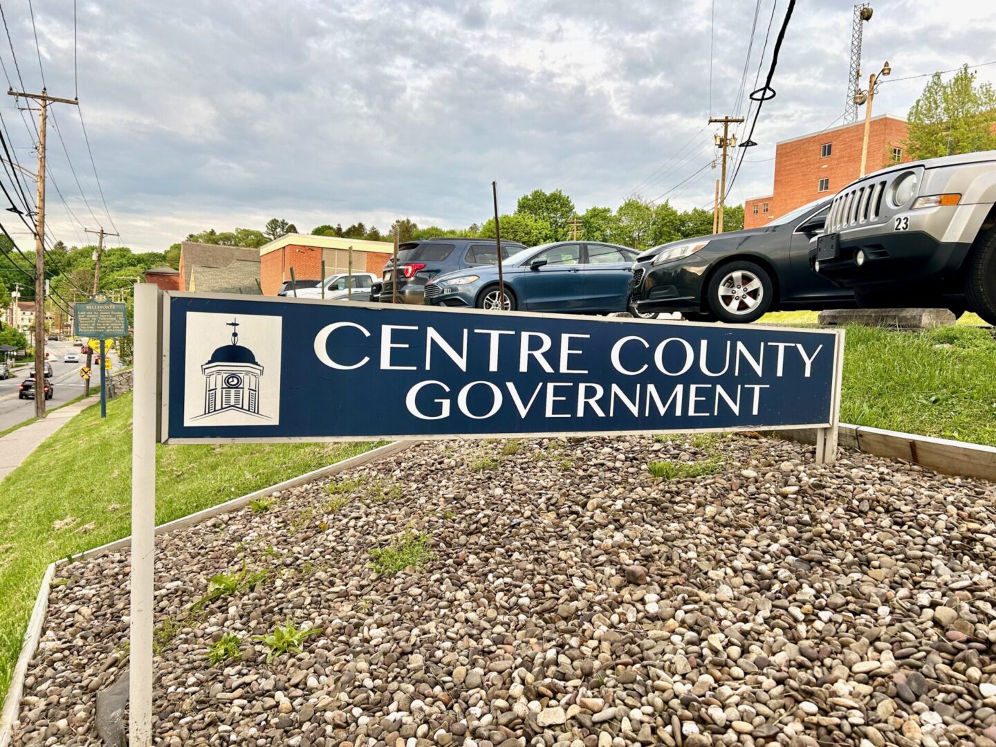 Blue and white Centre County Government sign outside the Willowbank Building in Bellefonte, Pa.