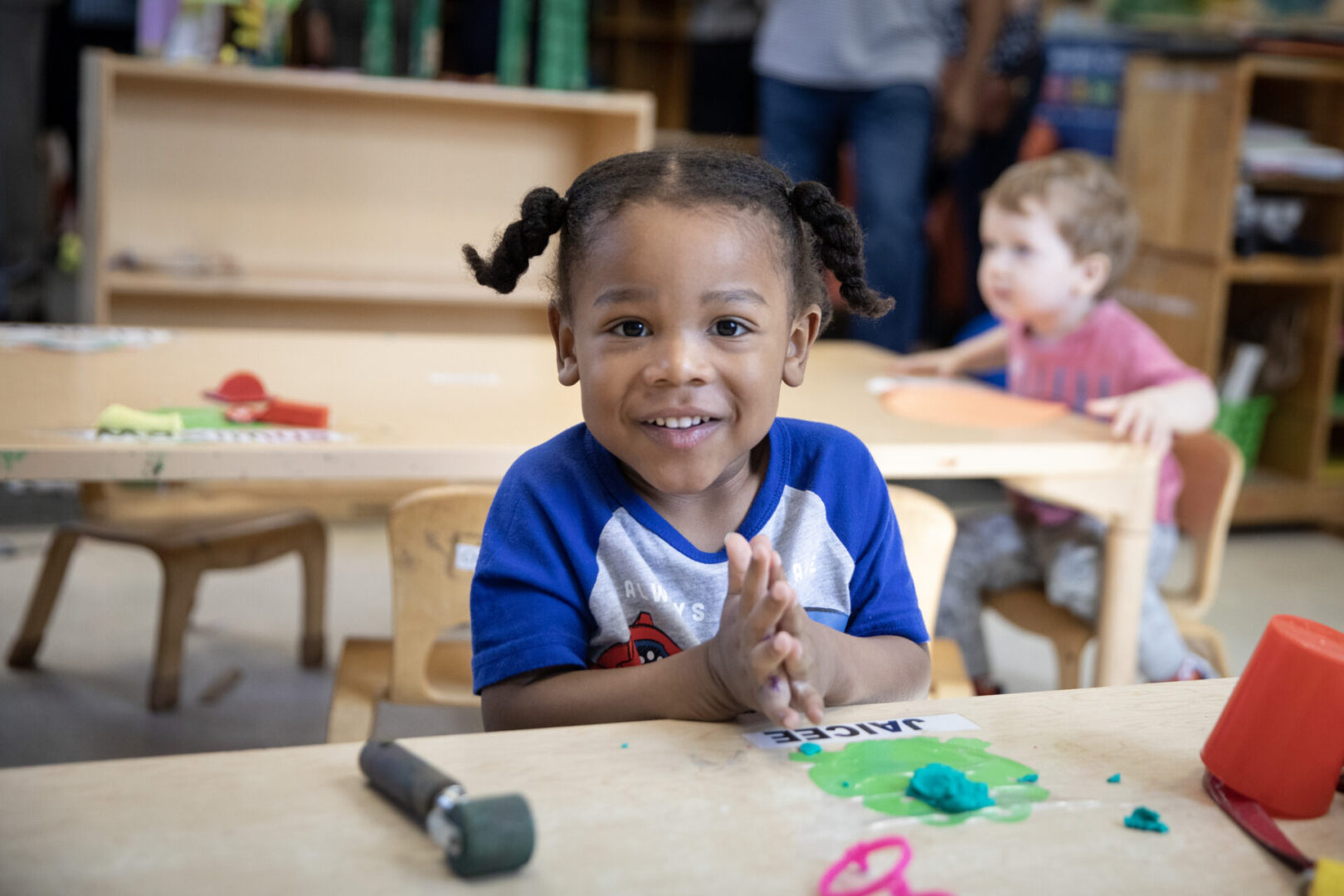 State College - child at table pittsburgh early learning center