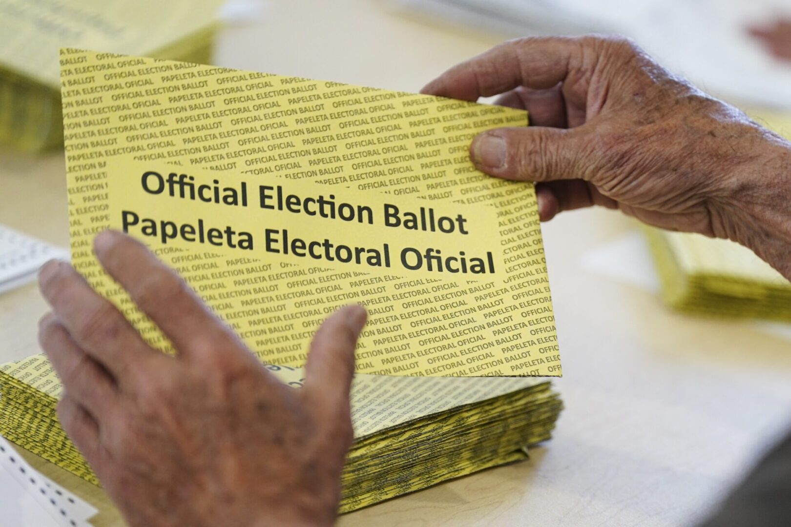 Workers sort mail ballots on primary Election Day 2024 at Northampton County Courthouse in Easton, Pennsylvania.