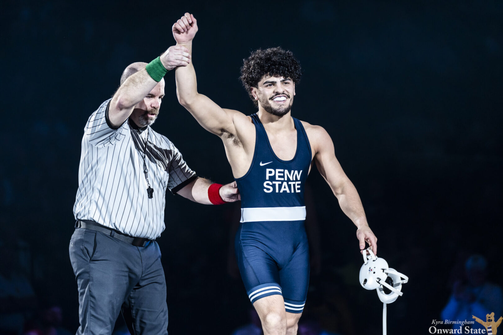 Penn State 141-pound wrestler Beau Bartlett's arm is raised after a pin of Wyoming's Cole Brooks on Sunday, Dec. 15, at the Bryce Jordan Center